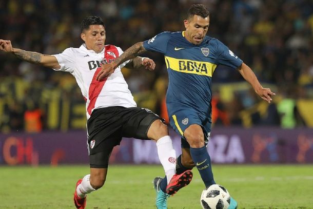 Enzo Pérez y Carlos Tevez