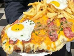 Con platos abundantes y una ambiente cálido, este bodegón porteño deleita con su amplia propuesta.