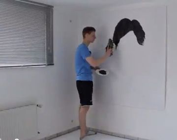 Un retrato gigante de Lionel Messi pintado con un botín