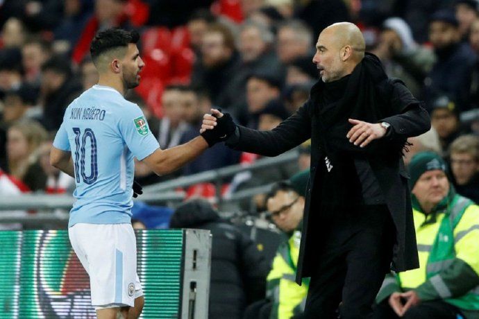 Sergio Kun Agüero y Pep Guardiola