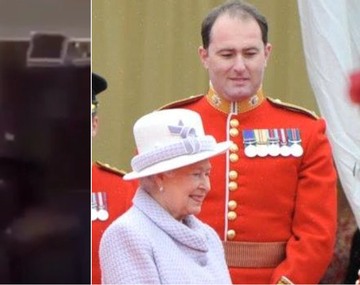 Filman a guardia real aspirando polvo