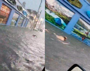 Un hombre se puso a nadar en las calles inundadas de Lanús